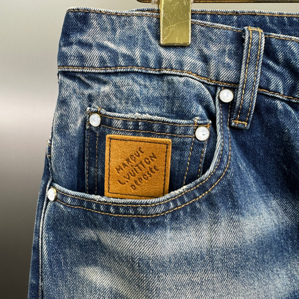 Louis Vuitton Sun-Faded Indigo Denim Trousers with Heritage Leather Patch