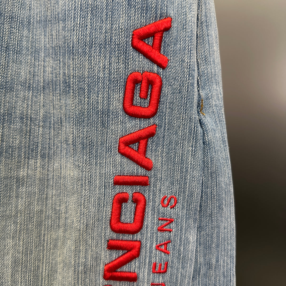 Balenciaga Light Wash Baggy Jeans with Red Side Logo