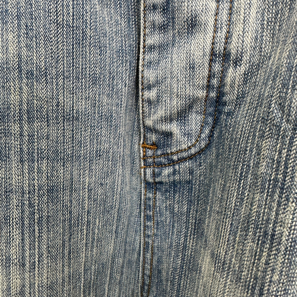 Balenciaga Light Wash Baggy Jeans with Red Side Logo
