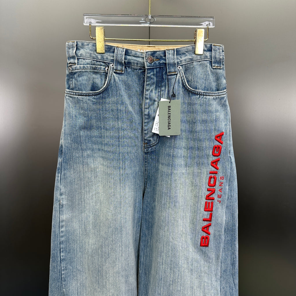 Balenciaga Light Wash Baggy Jeans with Red Side Logo