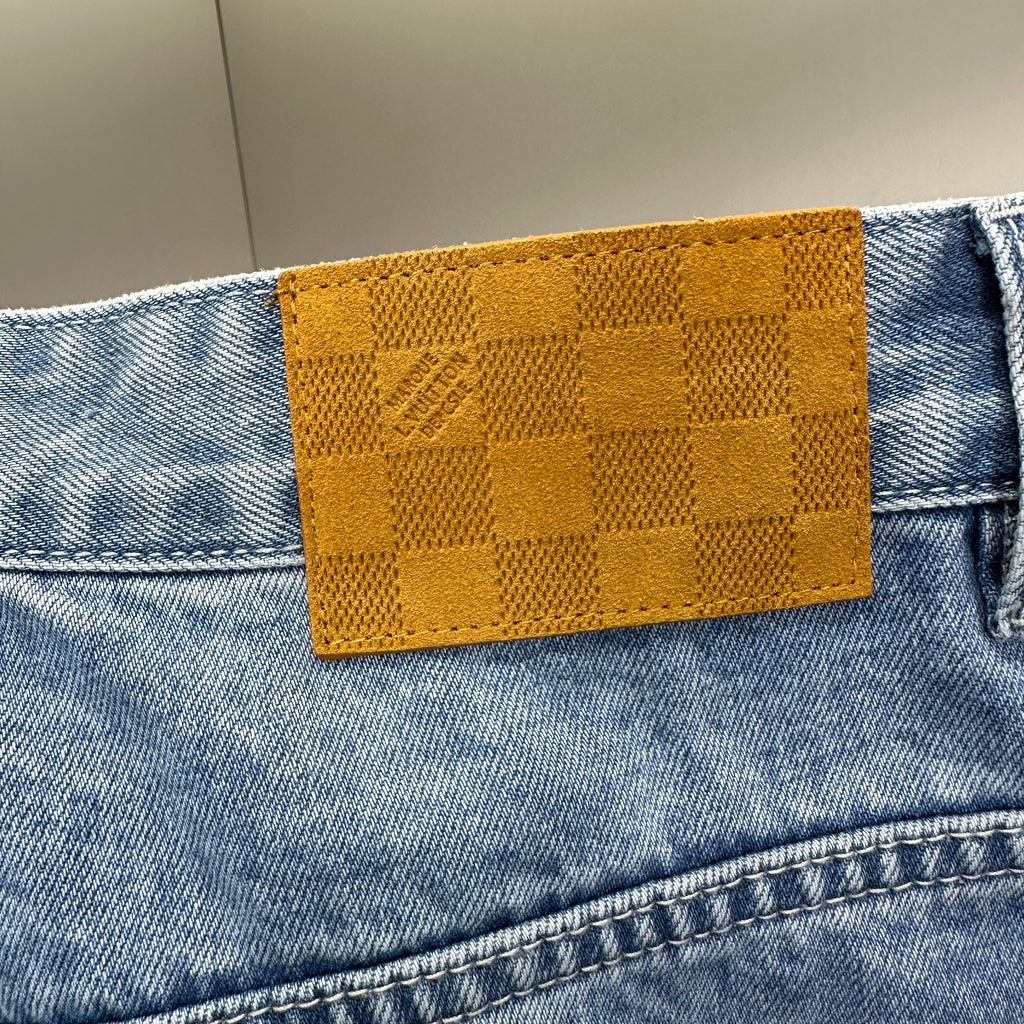 Louis Vuitton Washed Indigo Carpenter Fit Jeans with Frayed Monogram Panels