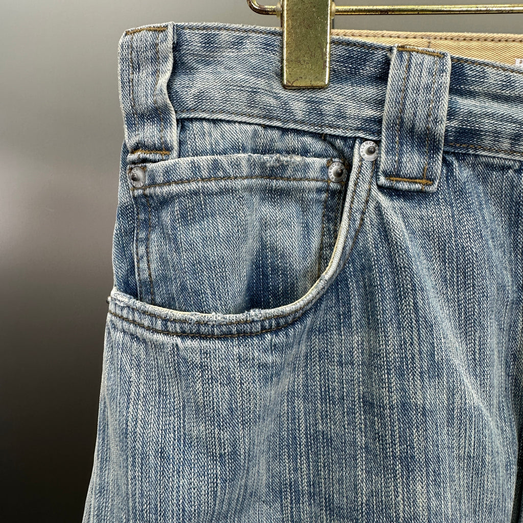 Balenciaga Light Wash Baggy Jeans with Red Side Logo