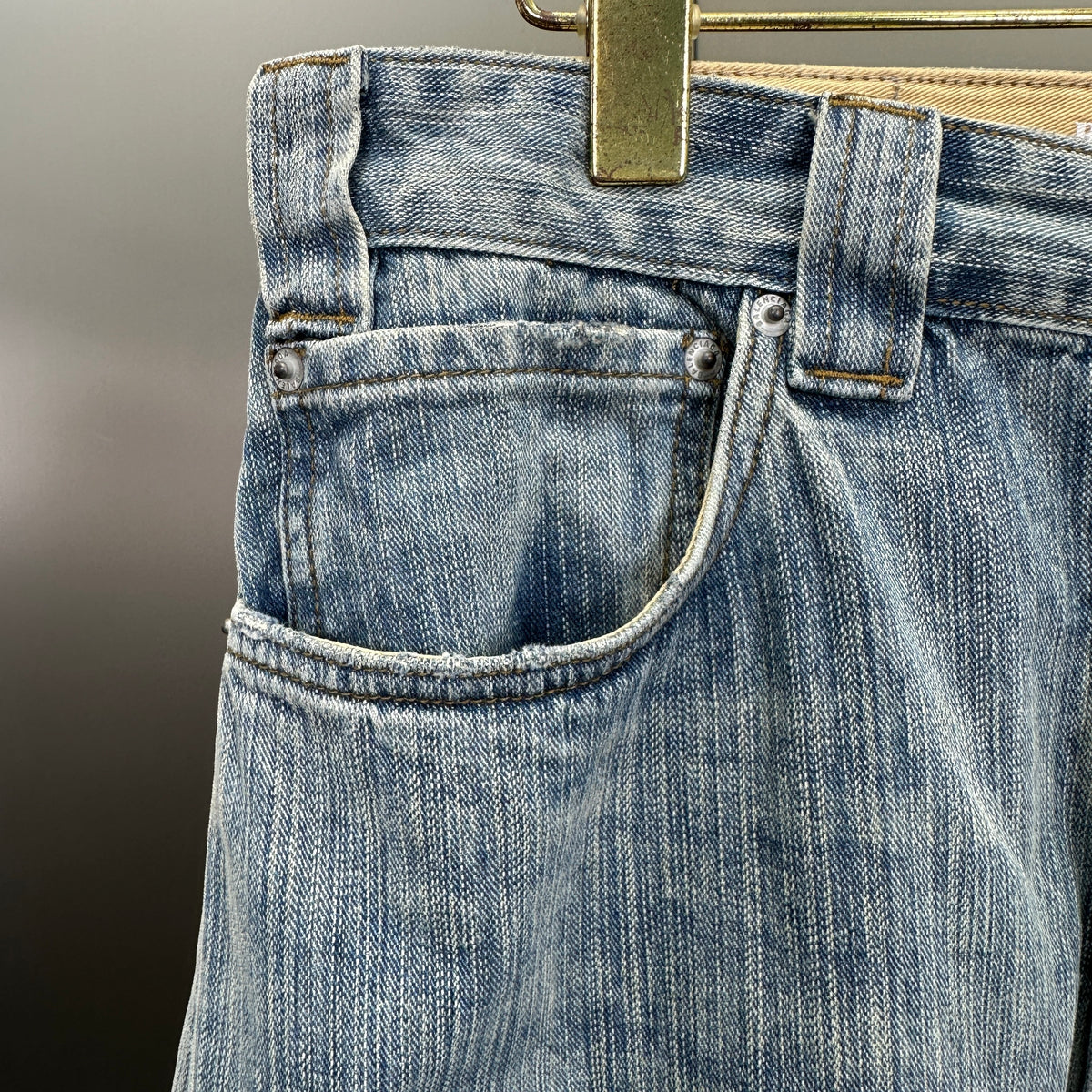 Balenciaga Light Wash Baggy Jeans with Red Side Logo