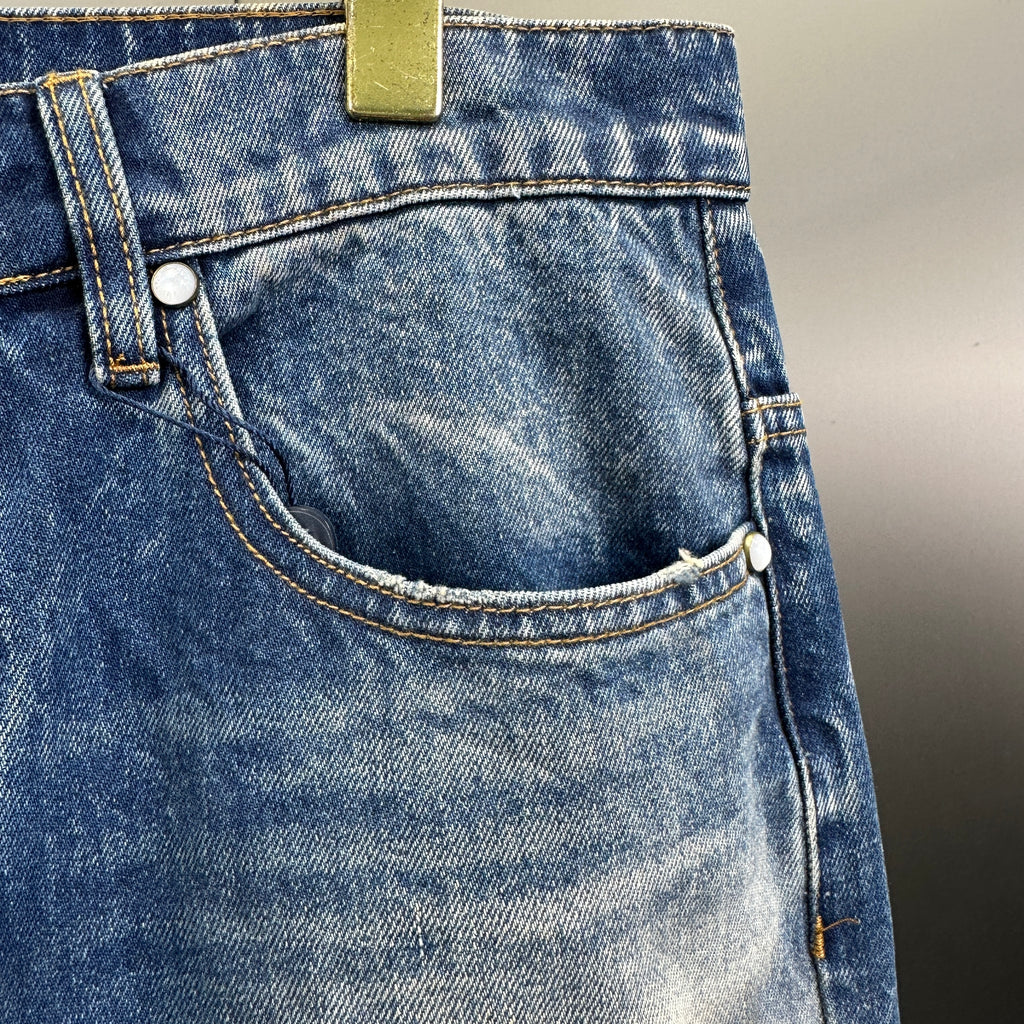 Louis Vuitton Sun-Faded Indigo Denim Trousers with Heritage Leather Patch