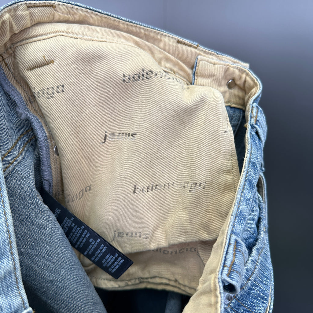 Balenciaga Light Wash Baggy Jeans with Red Side Logo