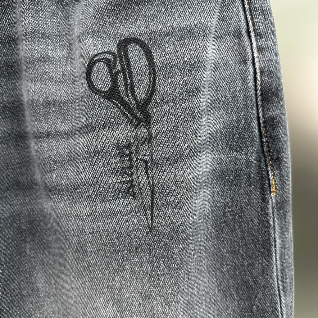 Balenciaga Crest & Artwork Embroidered Baggy Denim Pants