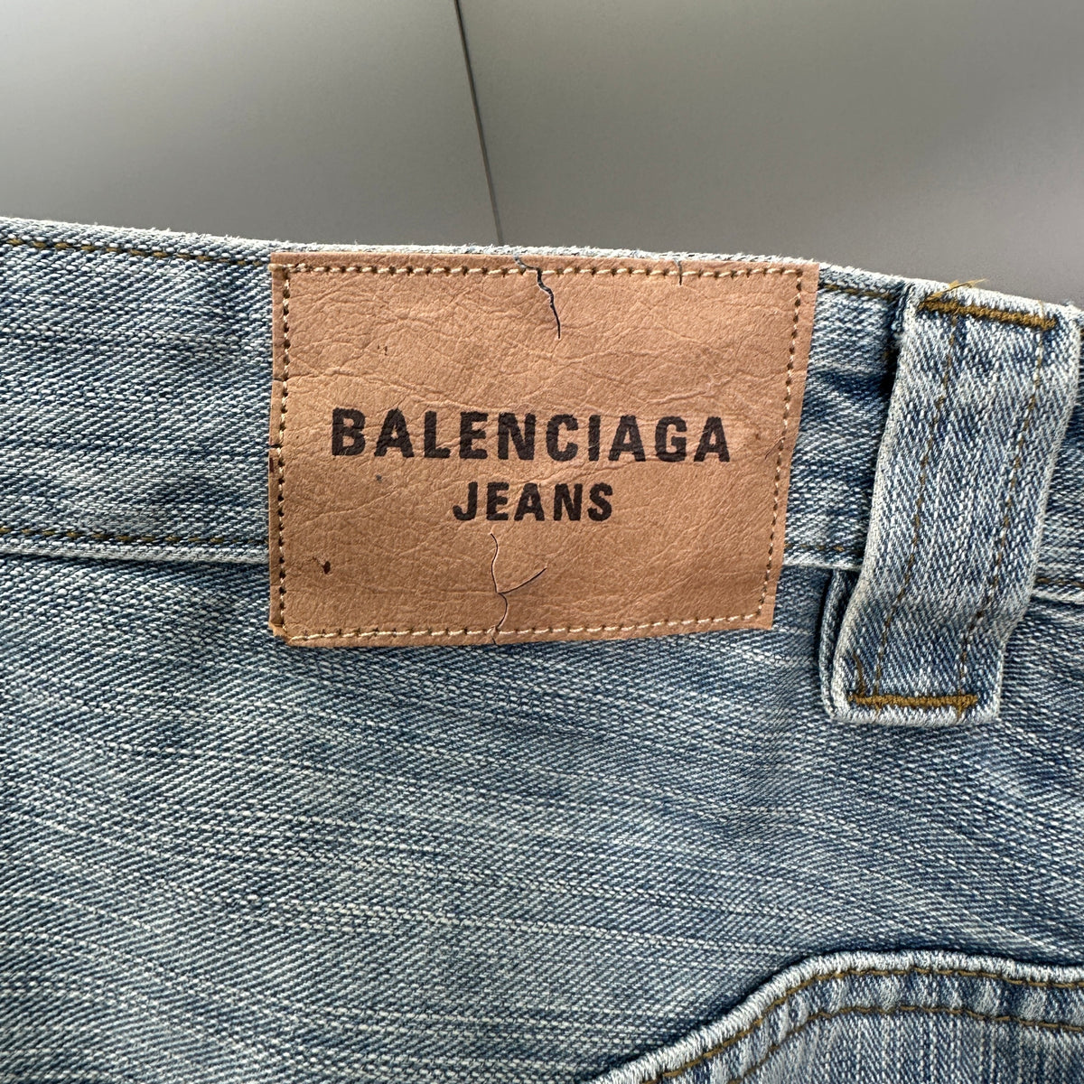 Balenciaga Light Wash Baggy Jeans with Red Side Logo