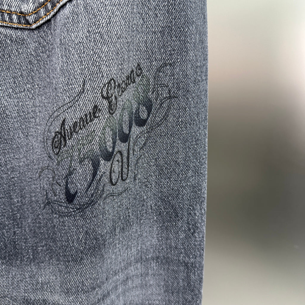 Balenciaga Crest & Artwork Embroidered Baggy Denim Pants