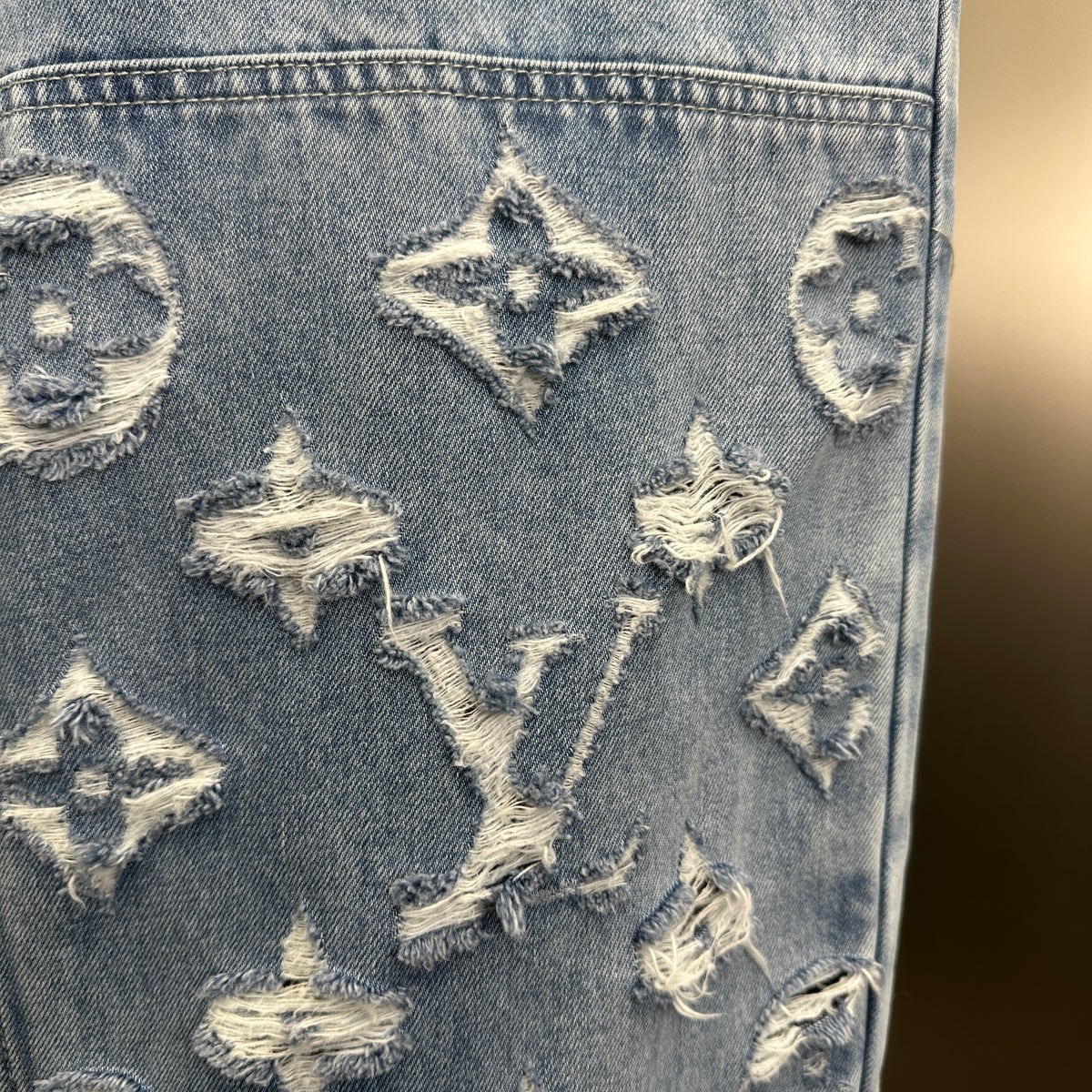 Louis Vuitton Washed Indigo Carpenter Fit Jeans with Frayed Monogram Panels