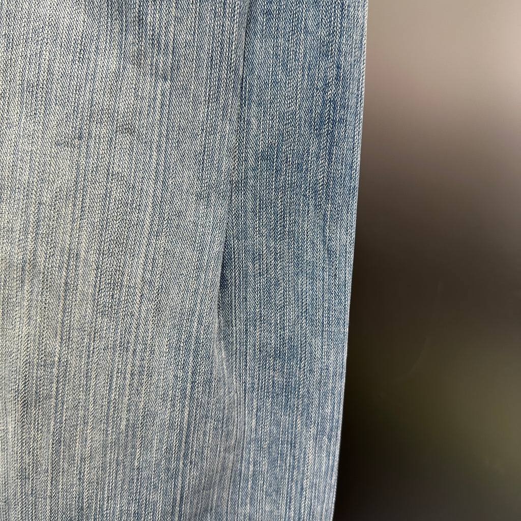 Balenciaga Light Wash Baggy Jeans with Red Side Logo