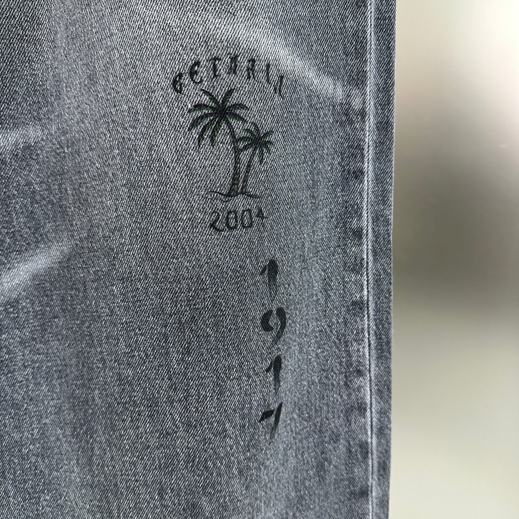 Balenciaga Crest & Artwork Embroidered Baggy Denim Pants