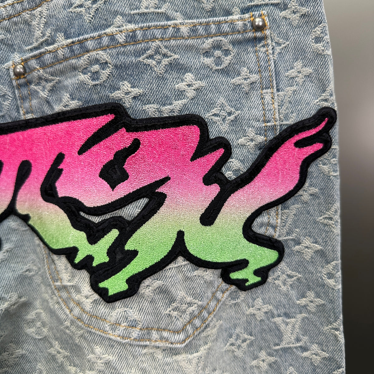Louis Vuitton Neon Graffiti Logo Monogram Denim Trousers – Bleached Indigo