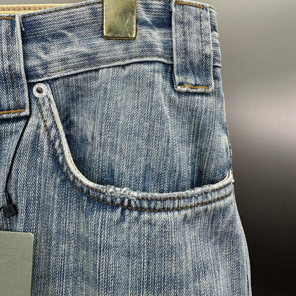 Balenciaga Light Wash Baggy Jeans with Red Side Logo